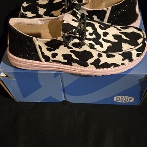 Hey Dude Black and White Cow Pattern Shoes with Pink Soles